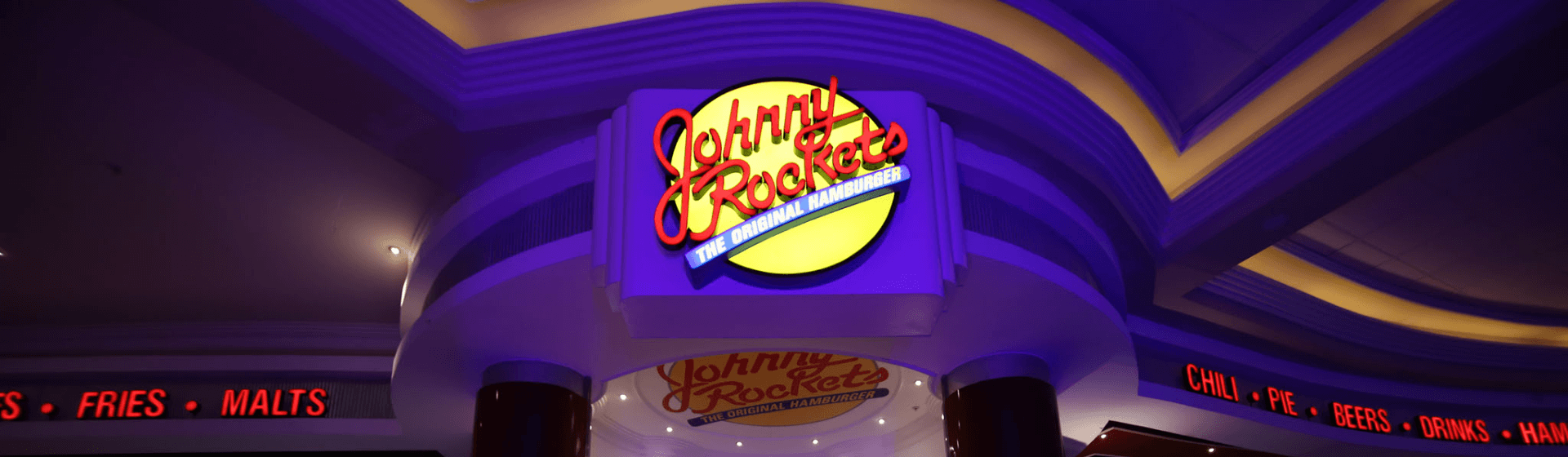 <p>JOHNNY ROCKETS</p>
